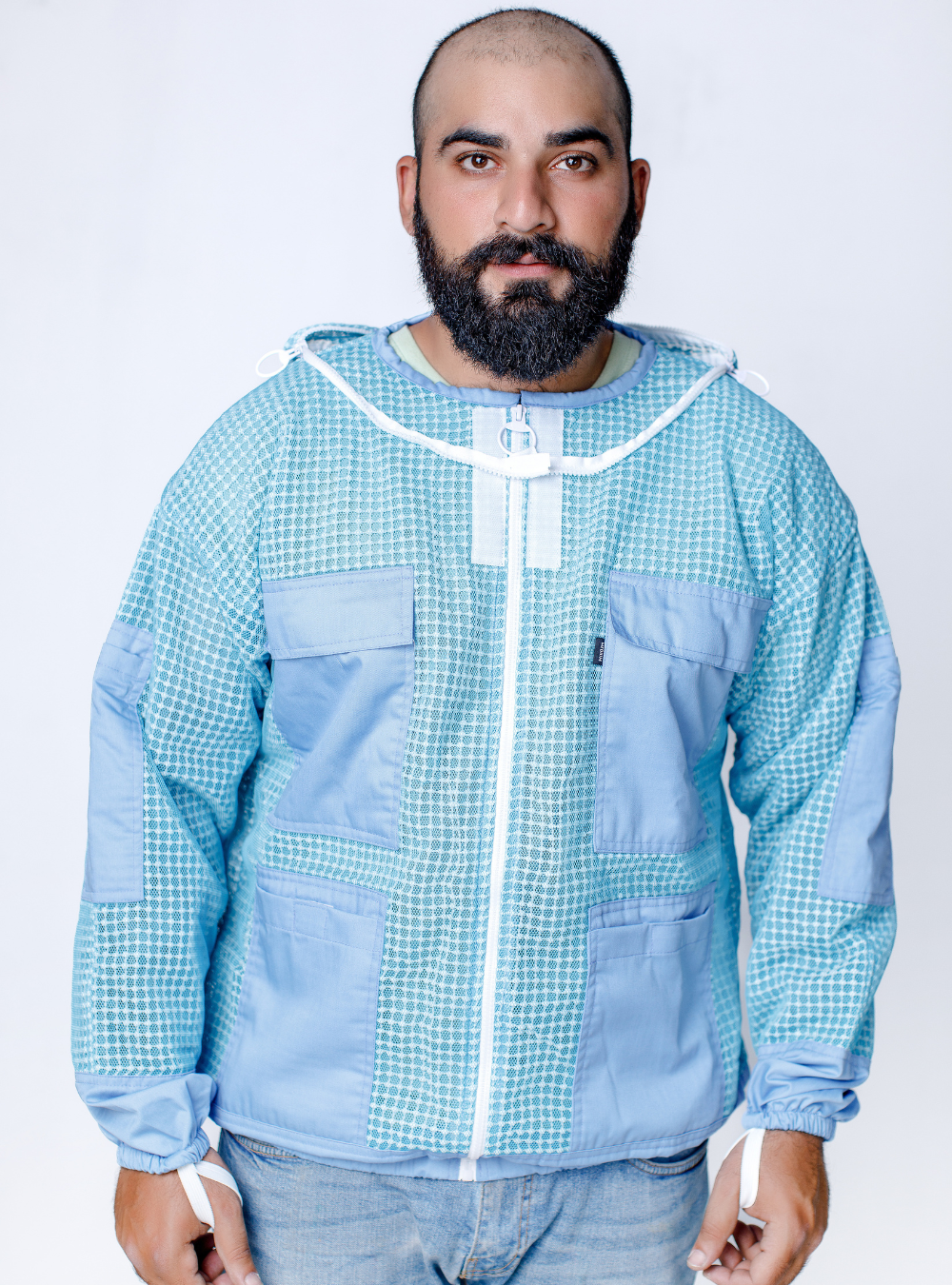 Aqua blue beekeeper jacket with a distinctive mesh pattern and reinforced pocket areas and detachable veil.