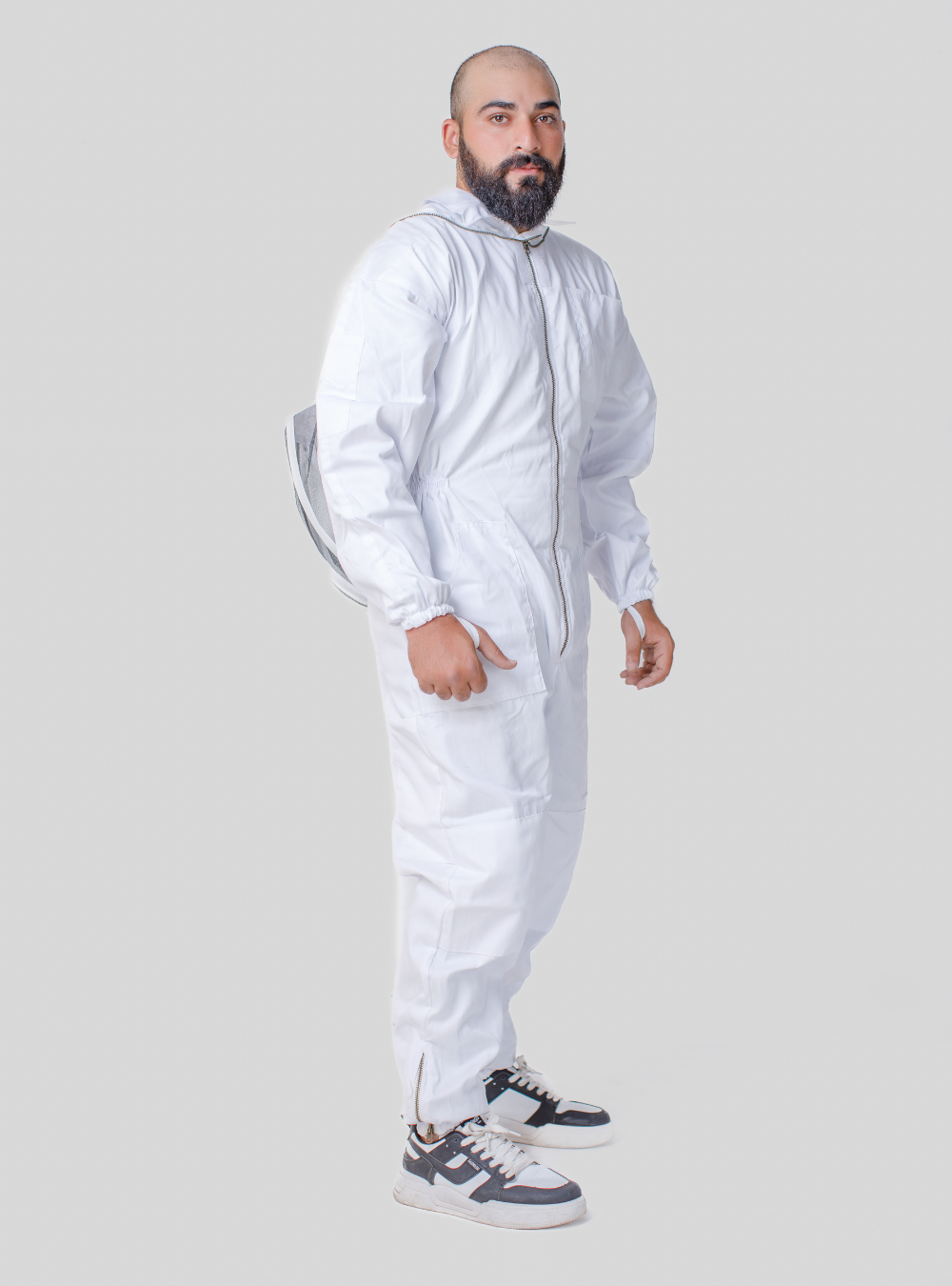 Detail view of a WhiteGuard Fencing Beekeeper Suit with a detachable round hood, matching gloves, highlighting the thick cotton material and ergonomic veil design for ease of movement