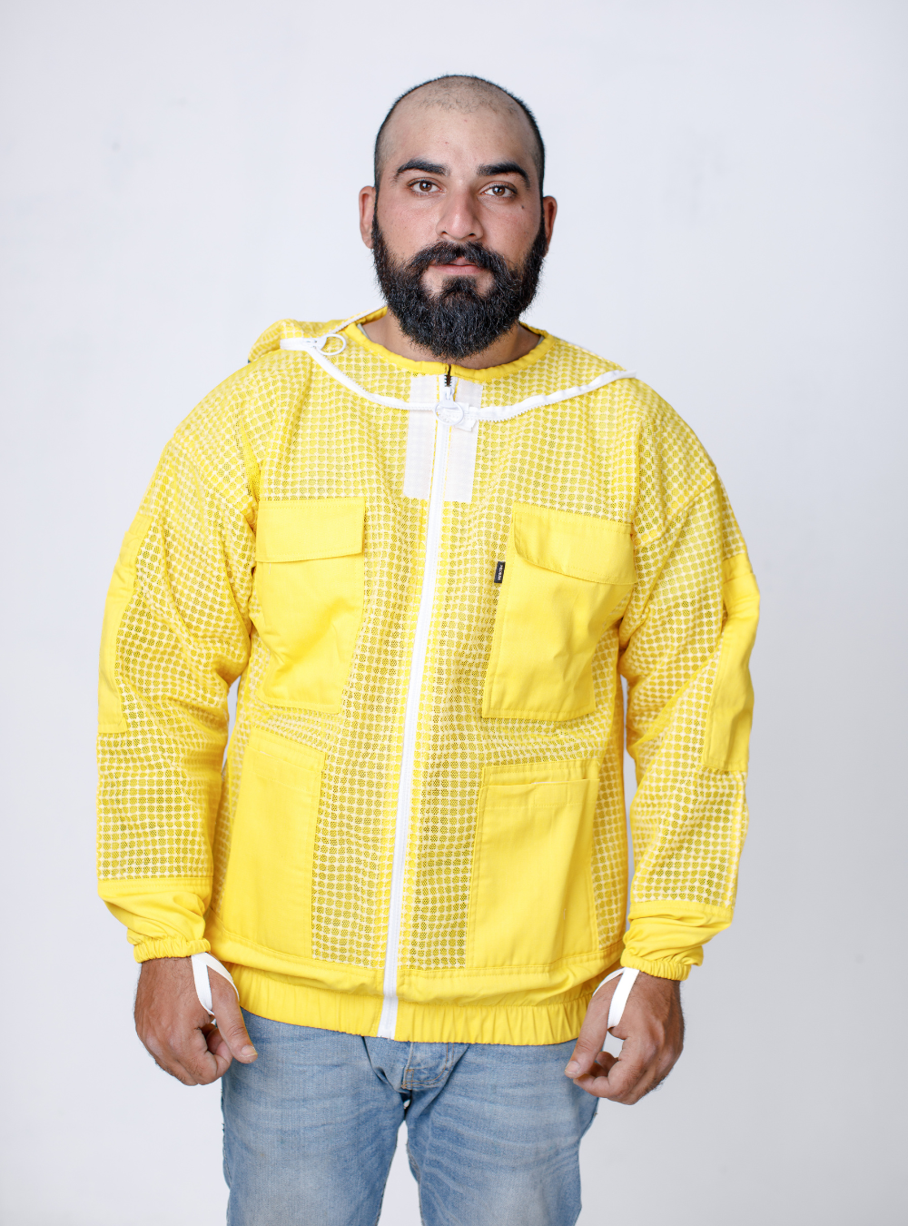 Stylish yet functional Yellow Beekeeping Ventilated Jacket in beige with a patterned mesh body, combining safety with modern aesthetics for beekeepers.
