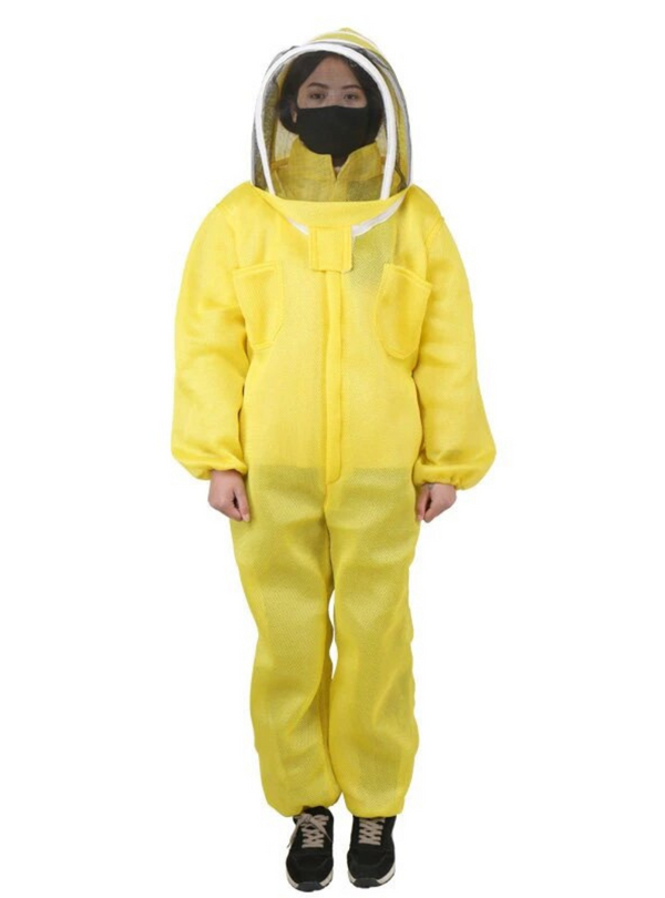 Full-body shot of a beekeeper dressed in a Yellow Breathable Beekeeping suit incorporating a Fencing Vail, multiple pockets, elastic cuffs for comfort, and double-stitched construction for durability.